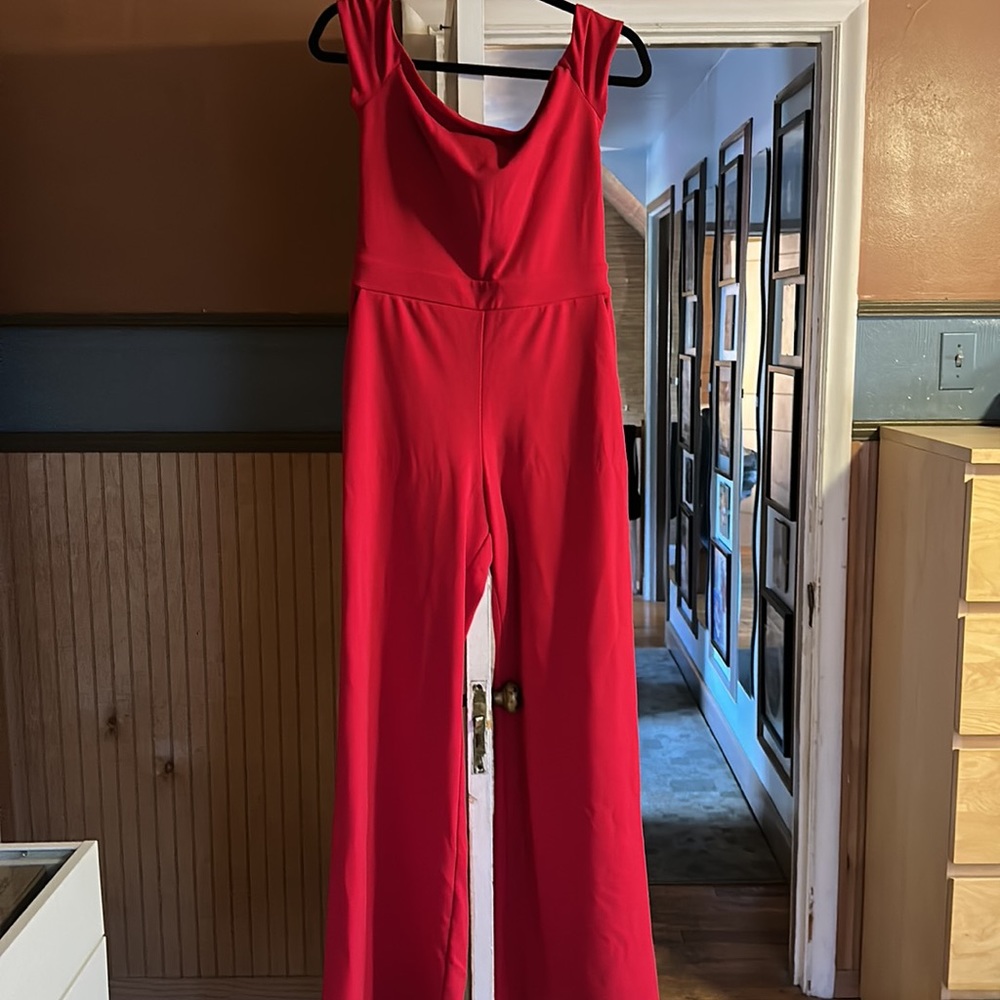 Express red flare leg jumpsuit.  Never worn, tags attached.  Originally 88.00 - Picture 2 of 3